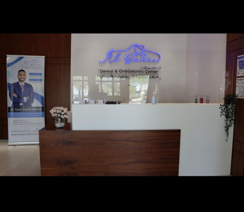 What are the essential qualities to look for a dentist in Abu Dhabi?