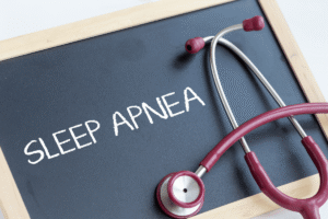 Child sleeping with open mouth showing signs of sleep apnea