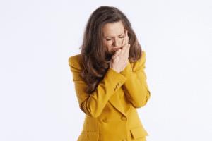 Dentist in Al Ain examining TMJ and jaw alignment for sleep issues