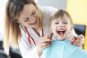 Pediatric dentist in Abu Dhabi treating child